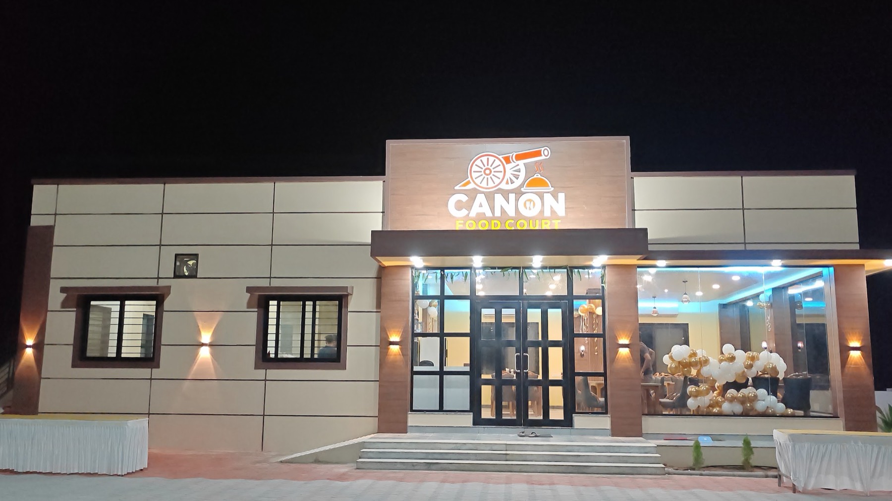 Canon Food Court lit up at night